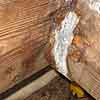 Corroded joist hanger damaged by moisture in Ridgewood, NJ