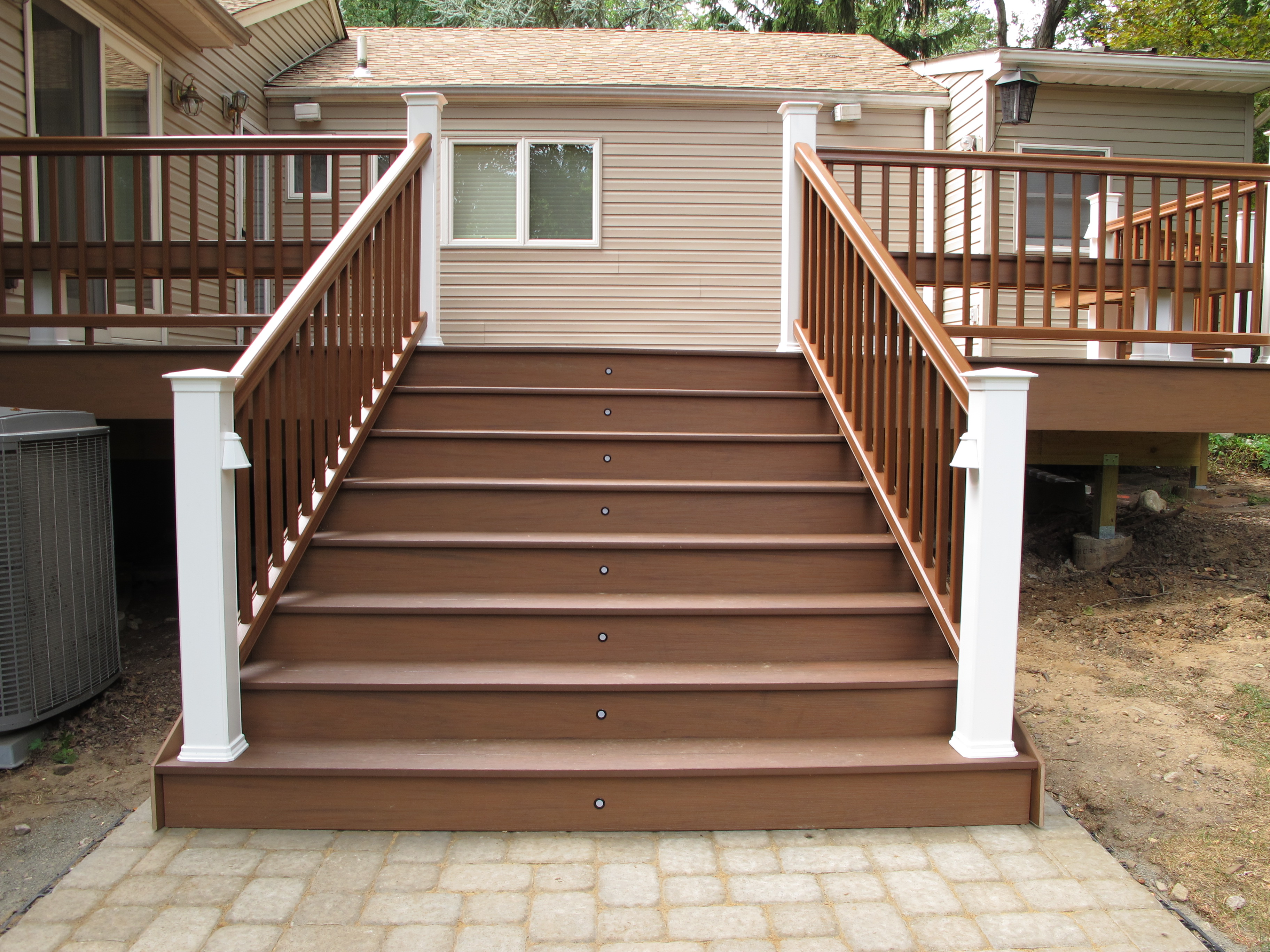 deck stairs landing concrete pavers flared flare staircase stairway projects